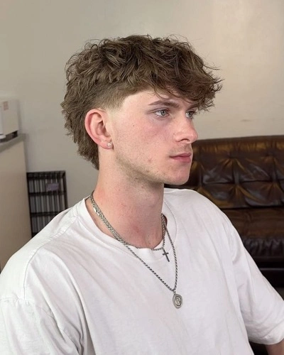 Low Taper Fade Fringe Blowout