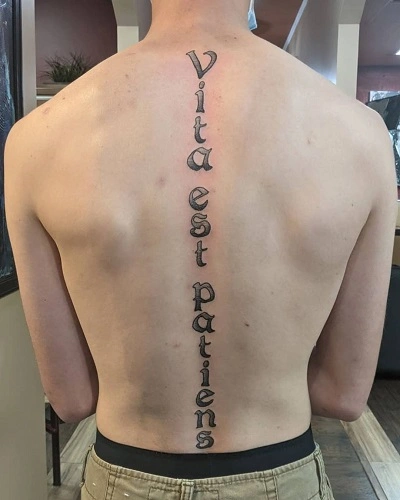 Script Spine Tattoos for men