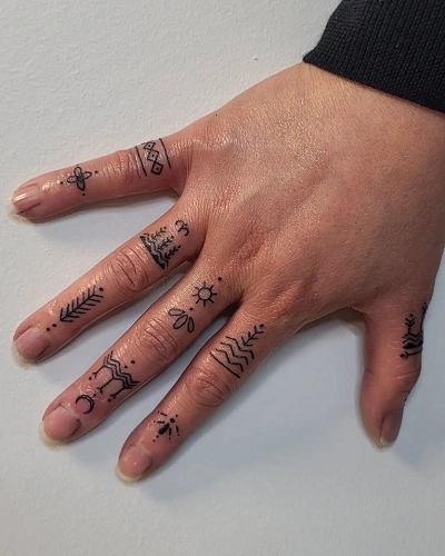 Tribal Knuckle Tattoos