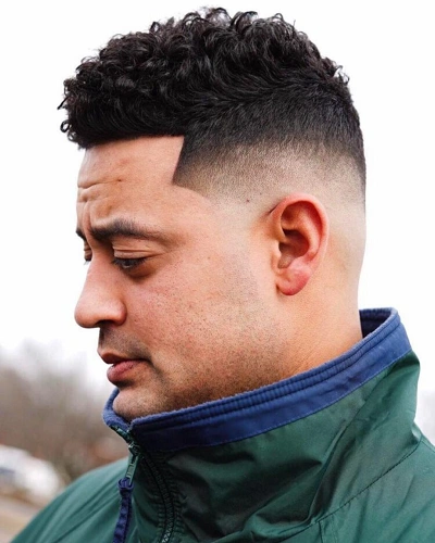 High Fade Curly Quiff